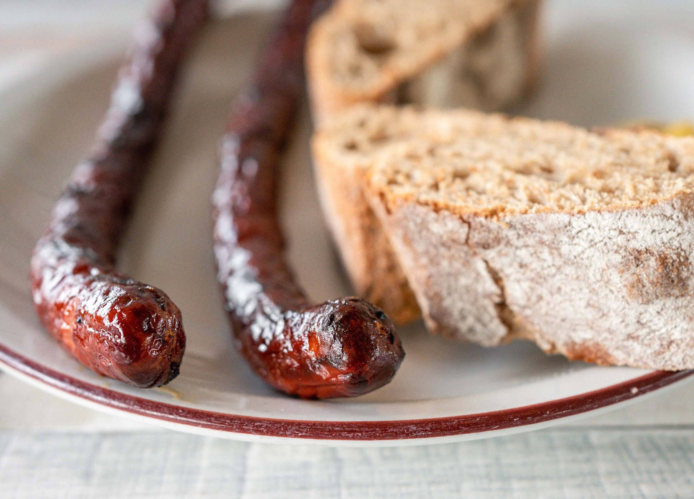 LUZ Seebistro Lamm Merguez mit Brot